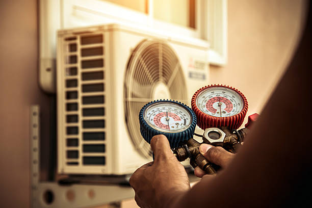 Professional Hvac Maintenance technician working in Quincy, MA